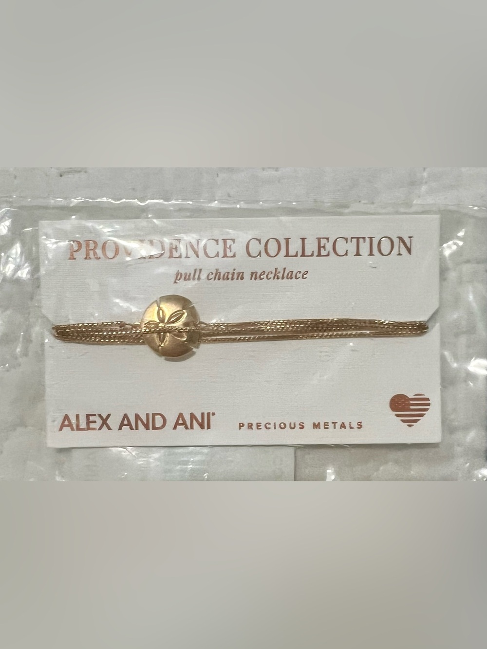 Alex and Ani gold sand dollar pull chain necklace NWT